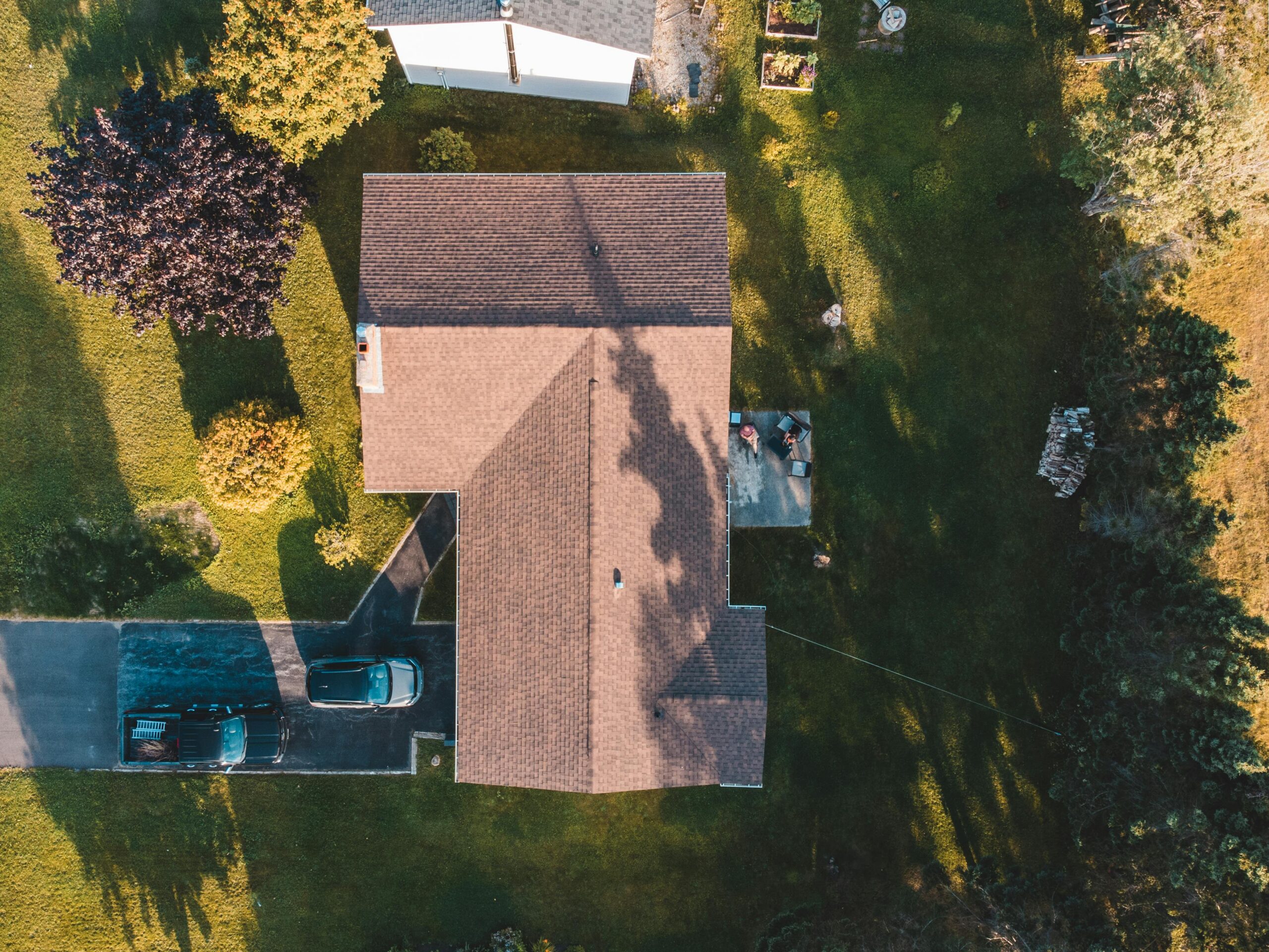 Aerial drone view of a Brentwood Tennessee home roof showing hail damage inspection